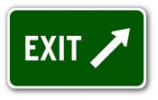 green exit sign with arrow